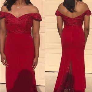 Red, sweetheart neckline dress with laced train